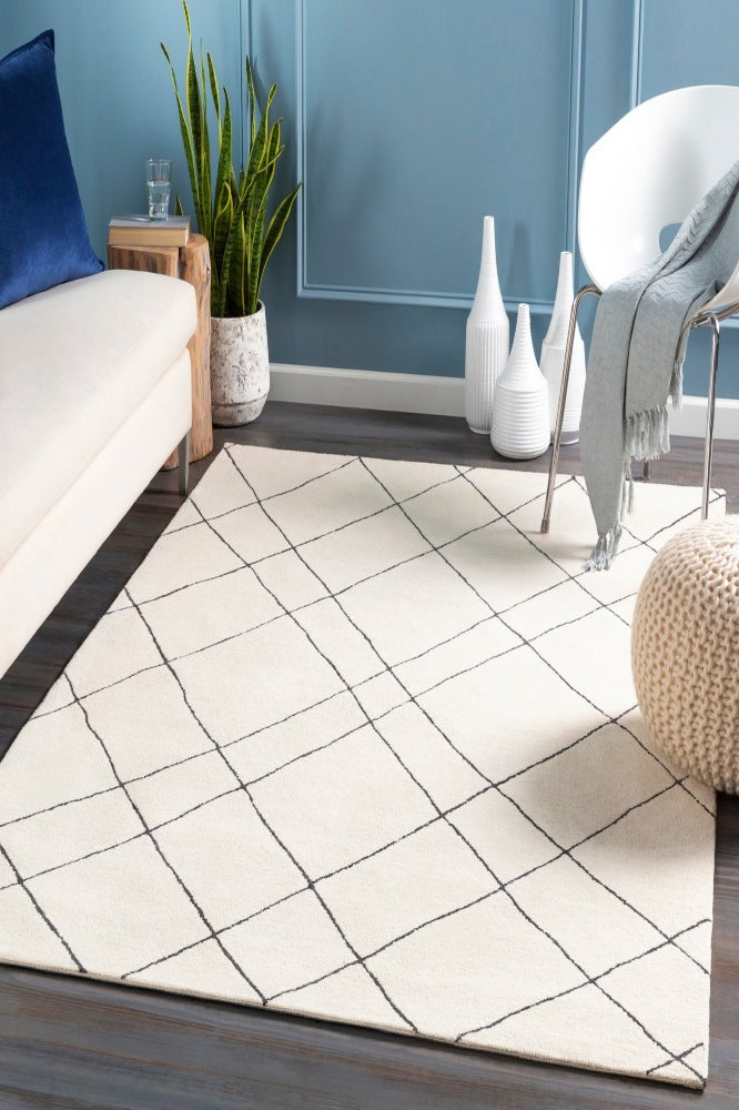 IVORY AND BLACK GEOMETRIC HAND TUFTED CARPET