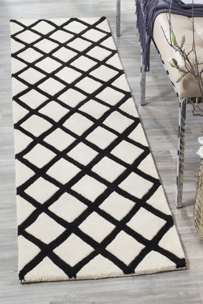 IVORY AND BLACK GEOMETRIC HAND TUFTED CARPET