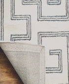 GREY AND IVORY GEOMETRIC HAND TUFTED CARPET