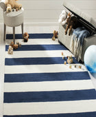 BLUE AND IVORY STRIPES HAND TUFTED CARPET