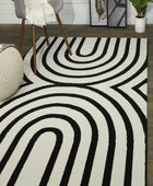 IVORY AND BLACK GEOMETRIC HAND TUFTED CARPET